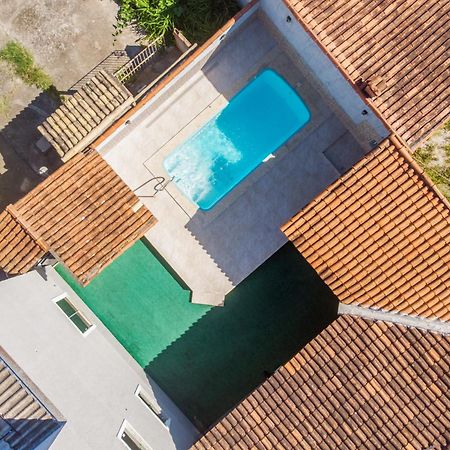 Refugio Tropical Casa De Praia Com Piscina Aquecida E 4 Suites E Garagem 3 Carros, 800 Mtrs Da Praia Internet 700 Mbps, Condominio Privado Com Pista De Skate , Quadra De Futevolei , Campos E Quadras De Futebol! Cabo Frio Esterno foto